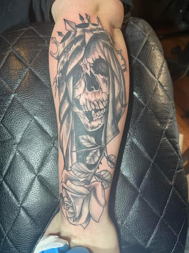 Explore mens behind ear tattoo ideas, creative tattoo ideas in Minersville, available at Foundation Tattoo & Art Studio