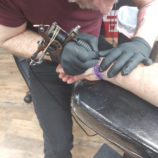 Find leo constellation tattoo ideas for your next unique tattoo in Abington at Ink Boss Tattoo & Piercing Studio