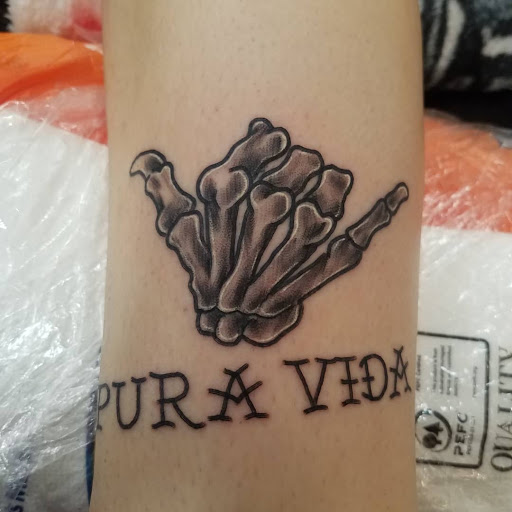 Explore male back tattoo ideas, creative tattoo ideas in Rogers, available at Jimmy Romance Tattoo & Body Piercing