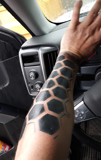 Tattoo Shop «Celebrity Tattoos», reviews and photos, 9520 Highland Rd, White Lake, MI 48386, USA