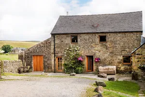 Herdwicks of Highfields Farm. Self Catering Holiday Barns in the Peak District image