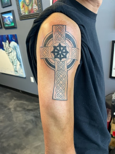 Explore violin tattoo ideas, creative tattoo ideas in Bradenton, available at Sacred Arts Tattoo Bradenton