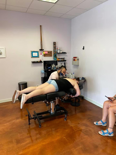 Explore mom and son tattoo ideas, creative tattoo ideas in Aledo, available at Elevated Tattoo & Piercing