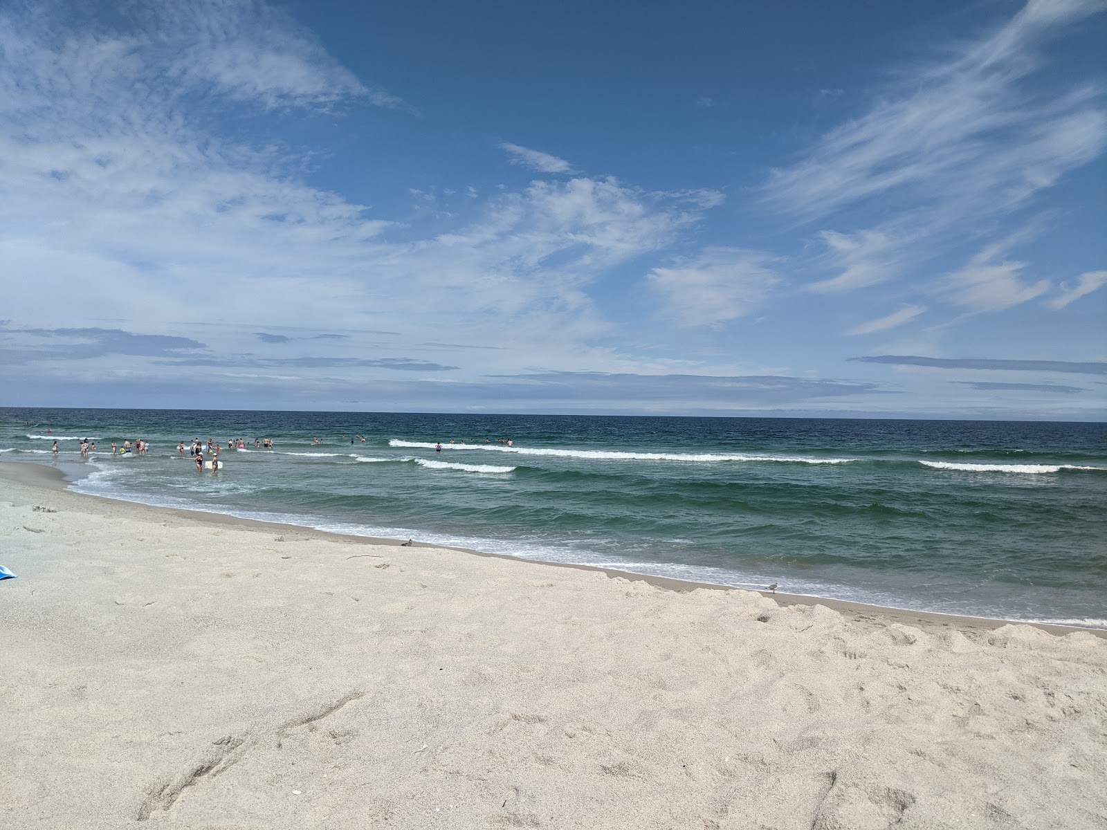 Lavallette Beach的照片 带有碧绿色纯水表面