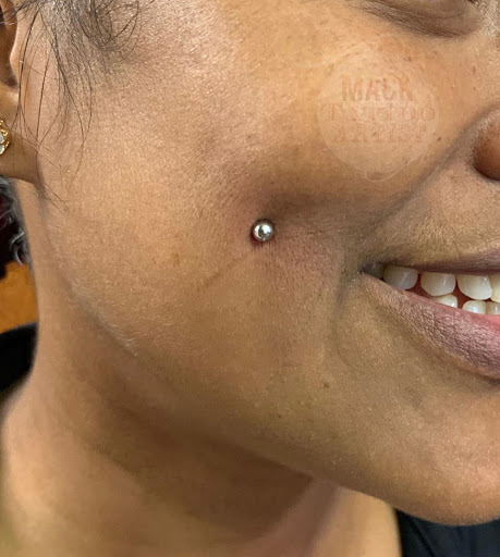 Explore black tattoo cover up ideas, creative tattoo ideas in Dallas, available at Fly Ink, Inc.