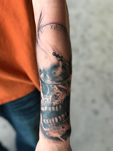 Explore hang loose tattoo ideas, creative tattoo ideas in Roscoe, available at Elevated Ink Tattoo