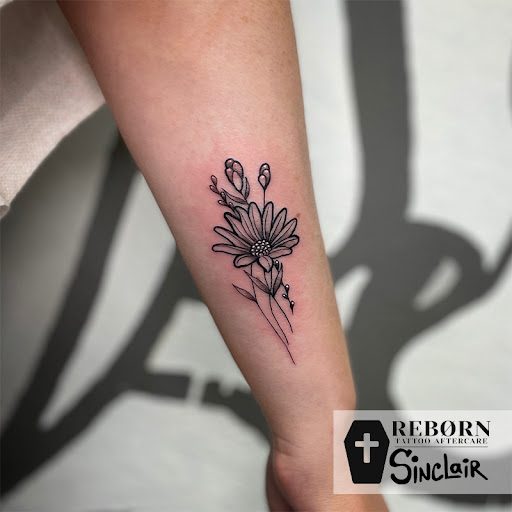 Explore red ink neck tattoo ideas, creative tattoo ideas in Zumbrota, available at Art by Sinclair Tattoo Artist At Dry Bones Ink