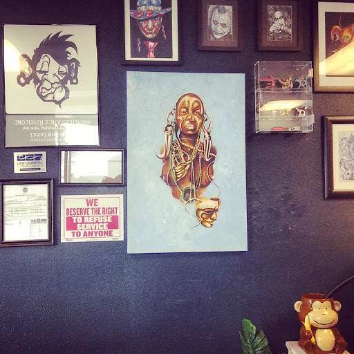 Explore doberman tattoo ideas, creative tattoo ideas in Los Angeles, available at Monkey Face Tattoos