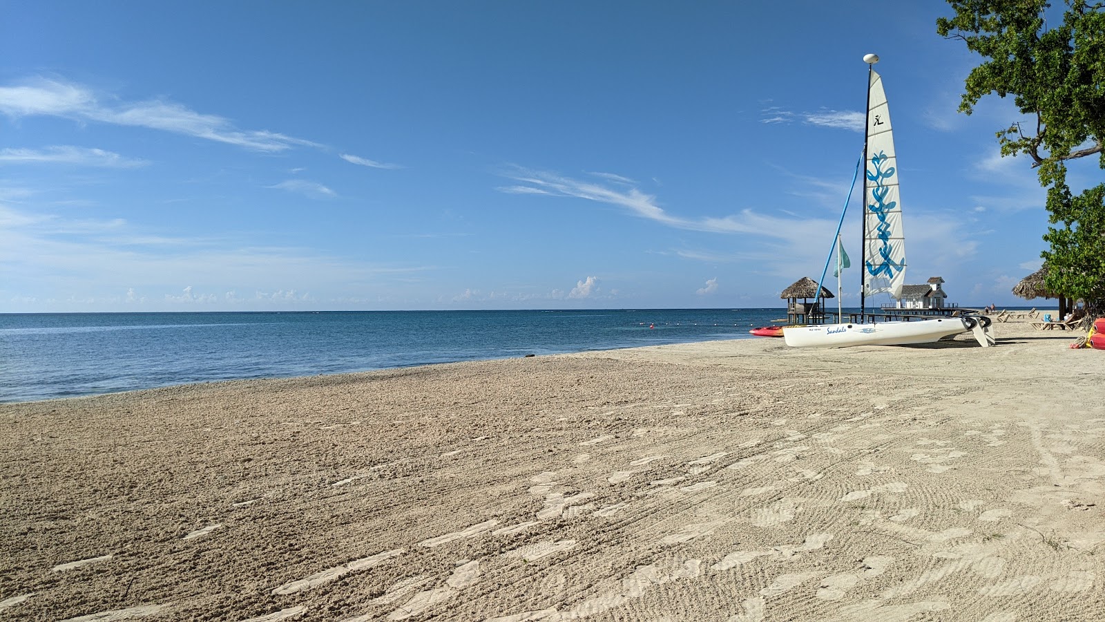 Zdjęcie Plażowe sandały i jego piękne krajobrazy