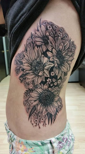 Explore tricep tattoo ideas, creative tattoo ideas in Taylor, available at Solid Tattoo LLC