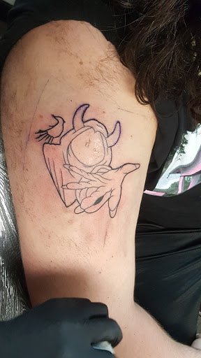 Explore surf tattoo ideas, creative tattoo ideas in Toledo, available at Artistik Tat2 and Body Piercing