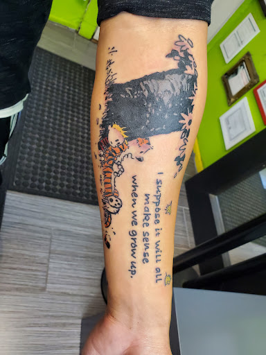 Explore mens upper back tattoo ideas, creative tattoo ideas in Chicago, available at Mind Crusher Tattoo