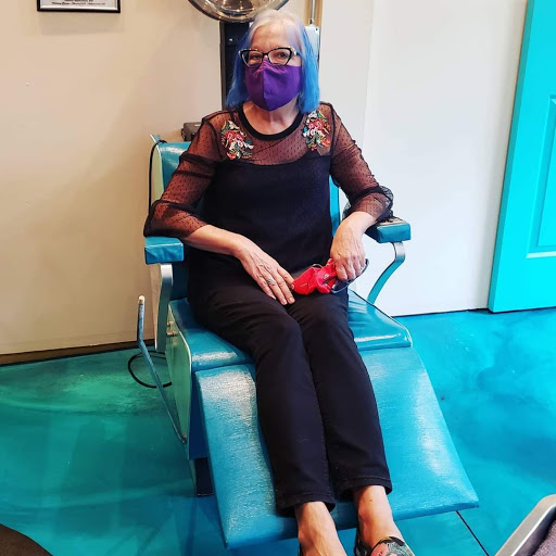 Explore dark feminine tattoo ideas, creative tattoo ideas in Traverse City, available at Pinups & Needles