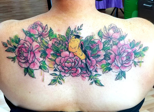 Explore religious tattoo ideas, creative tattoo ideas in Benton, available at Spectrum Tattoo