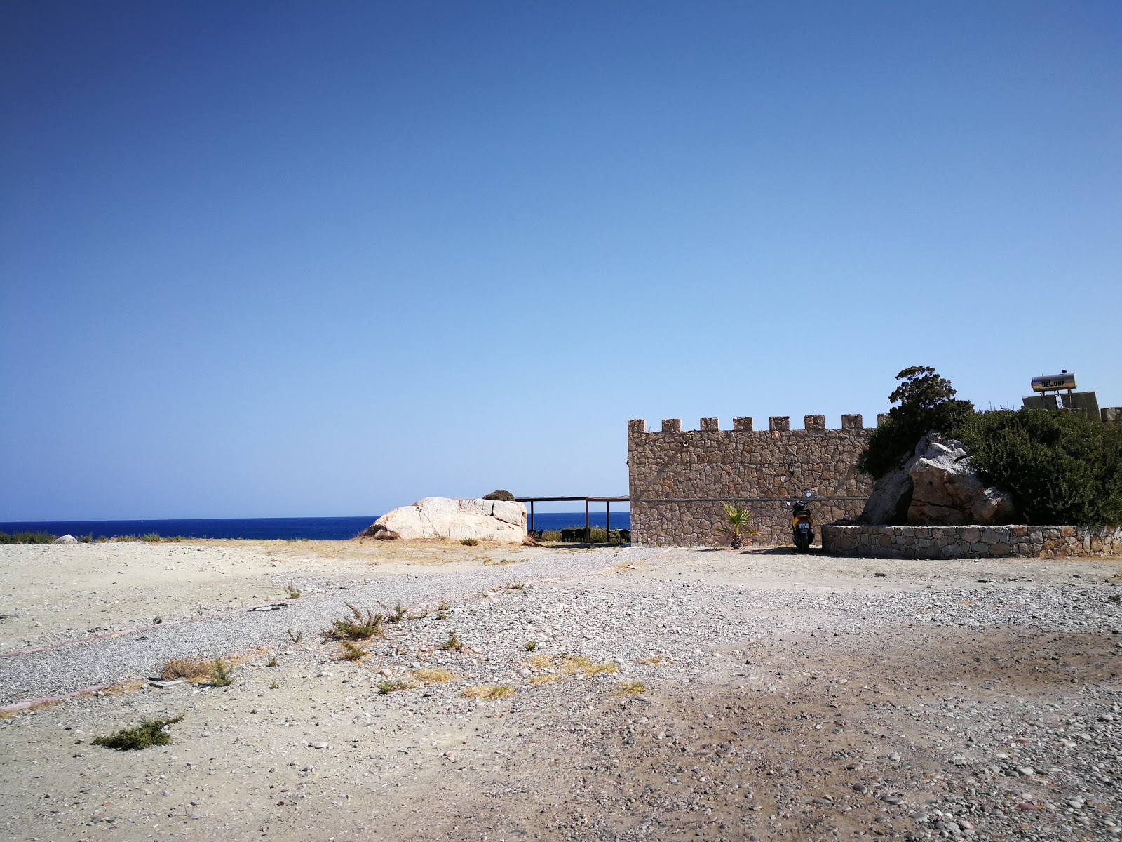 Foto de Praia do Castelo Sul e o assentamento