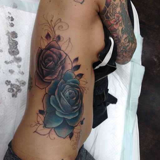 Explore dog collar tattoo ideas, creative tattoo ideas in Abilene, available at La Leyenda Tattoo Co