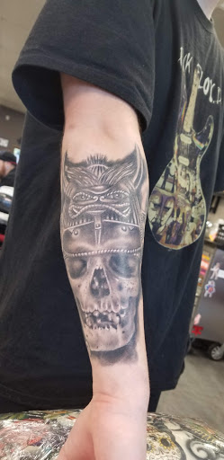 Explore bell tattoo ideas, creative tattoo ideas in Modesto, available at Ink Disciples Tattoo Parlor