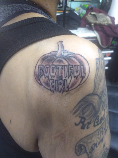 Explore ring tattoo cover up ideas, creative tattoo ideas in Florissant, available at St. Louis Ink