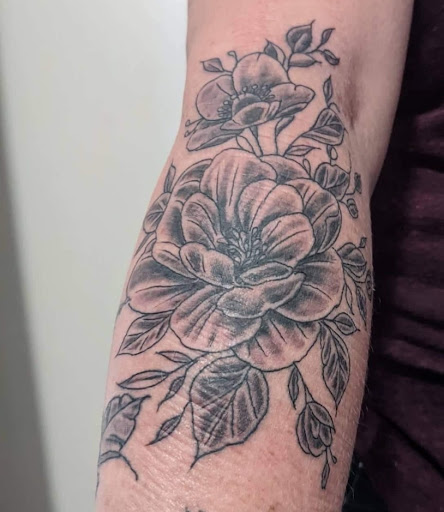 Explore snake sleeve tattoo ideas, creative tattoo ideas in Hattiesburg, available at Sinful Aart Tattoo