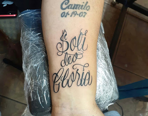 Explore barber pole tattoo ideas, creative tattoo ideas in Okeechobee, available at Muck City Tattoos & Piercings