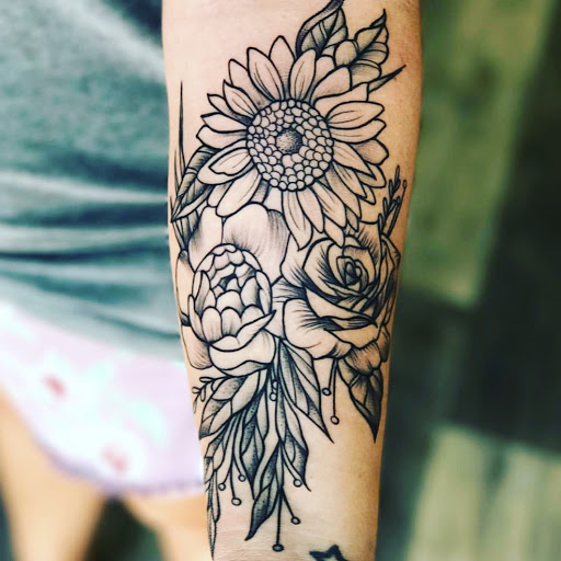 Explore hand wrist tattoo ideas, creative tattoo ideas in Waynesboro, available at Tattooed In the Wild Studio
