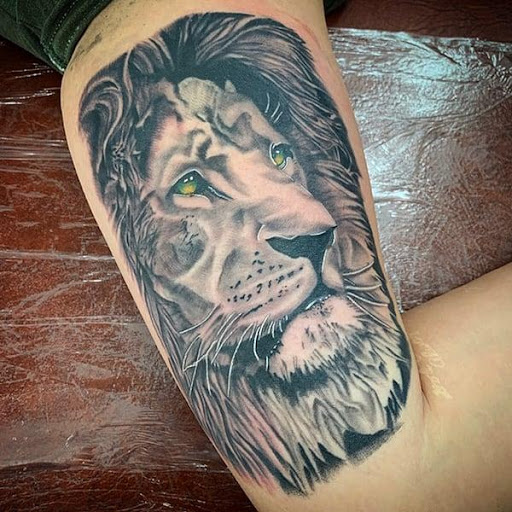 Explore zebra tattoo ideas, creative tattoo ideas in Orange, available at Leftys Tattoo