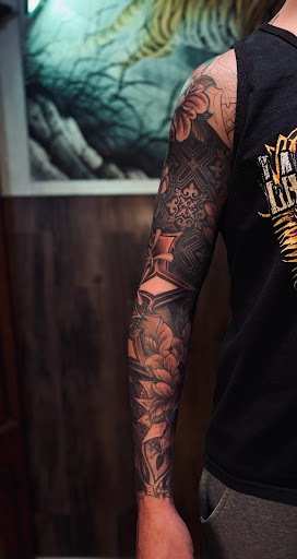 Explore quarter size tattoo ideas, creative tattoo ideas in Hudson, available at The Bohemian Social Club