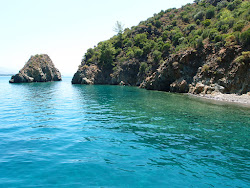Foto di Daily beach II con baia piccola