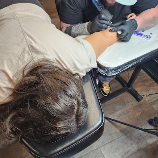 Explore mens wedding band tattoo ideas, creative tattoo ideas in Broomfield, available at Tribal Rites Tattoo and Piercing Westminster