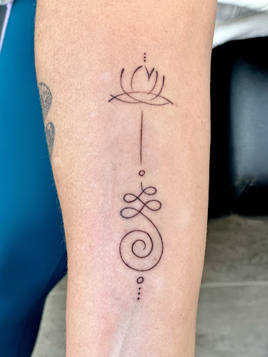 Explore neck tattoo ideas, creative tattoo ideas in Freedom, available at Darcy Robinson Permanent Cosmetics and tattoo