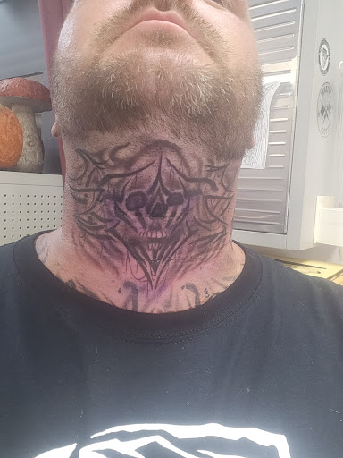 Explore lotus tattoo ideas, creative tattoo ideas in Hilliard, available at 22 Caliber Tattoo Mega Studio