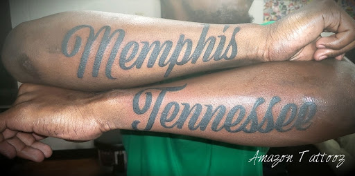 Explore hand tattoo ideas man, creative tattoo ideas in West Memphis, available at Amazon Tattooz LLC