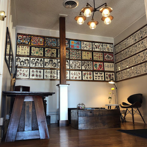 Explore dad son tattoo ideas, creative tattoo ideas in Buffalo, available at The Tilted Rose Tattoo