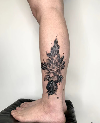 Explore anime leg tattoo ideas, creative tattoo ideas in Orange, available at Baron Art Tattoo