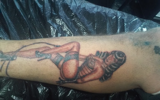 Explore fine line tattoo ideas for females, creative tattoo ideas in Madison, available at Ultimate Arts Tattoo