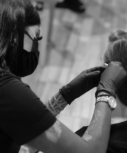 Explore skull hand tattoo ideas, creative tattoo ideas in San Antonio, available at Firme Copias Tattoo Studio