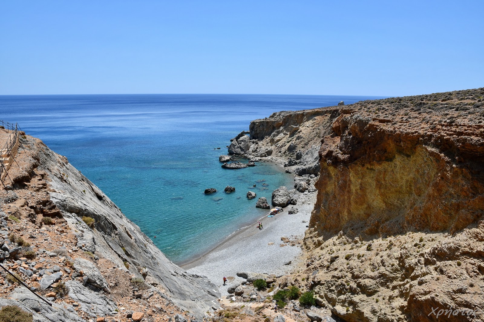 Fotografija Agios Nikitas beach z turkizna čista voda površino