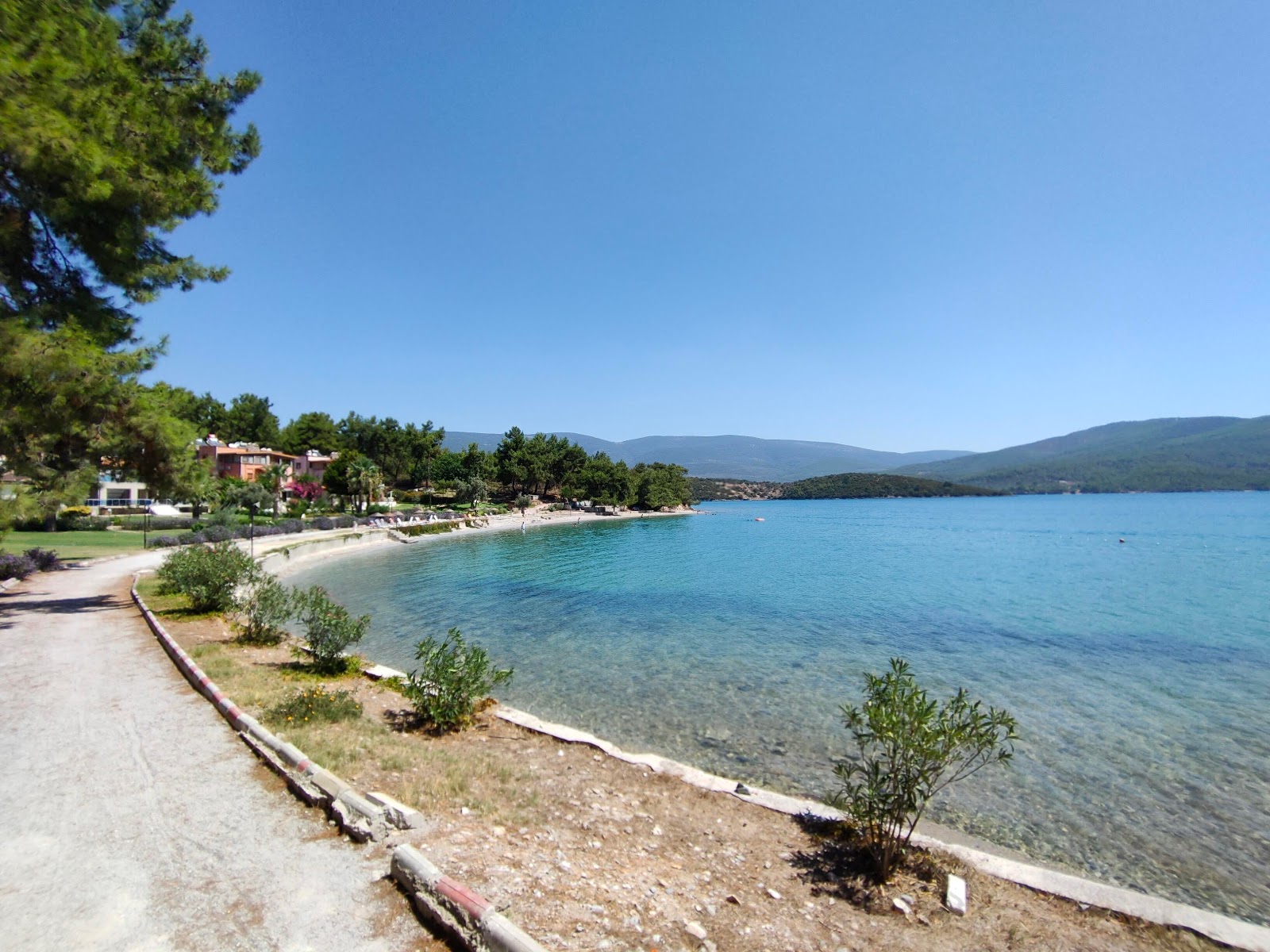 Fotografie cu Mandalya beach cu o suprafață de apa pură turcoaz
