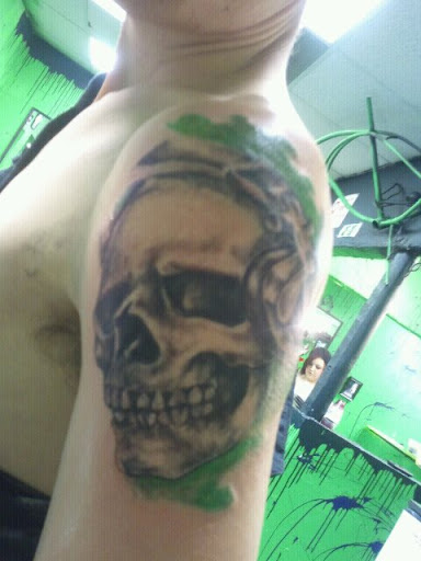 Explore chest and neck tattoo ideas, creative tattoo ideas in Dallas, available at Freak Show Studio