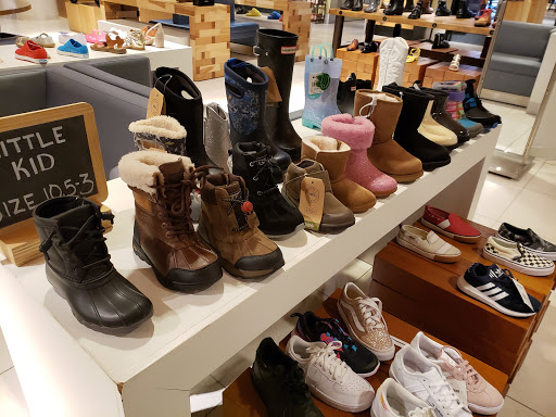 Stores to buy women's beige boots Calgary