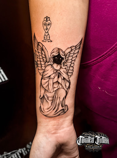 Explore cross tattoo ideas forearm, creative tattoo ideas in San Antonio, available at Twisted Tattoo