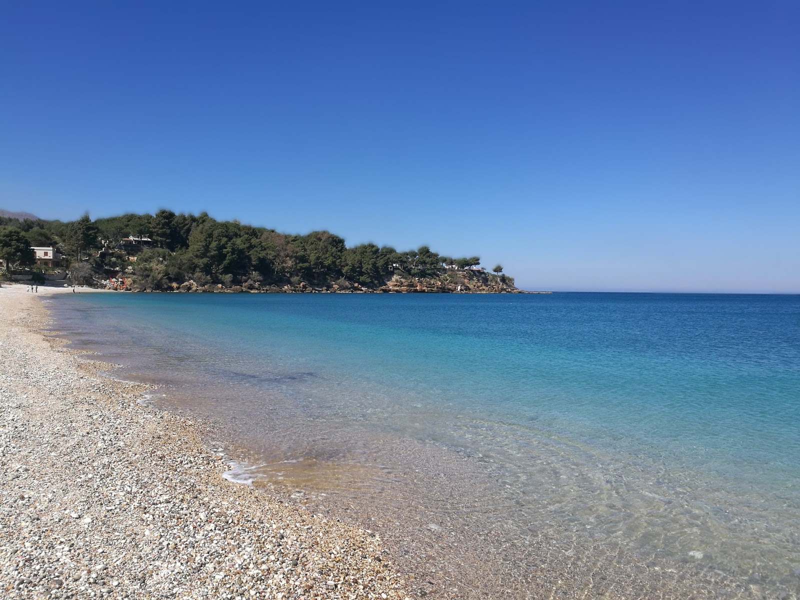 Photo of Guidaloca Beach with turquoise pure water surface