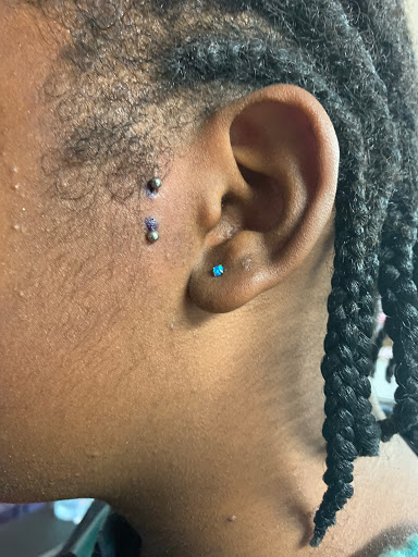 Explore tattoo ideas breast cancer ribbon, creative tattoo ideas in Aurora, available at Wild West Tattoo & Piercing