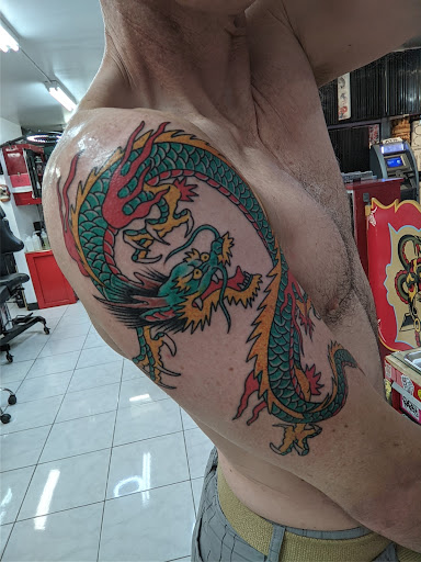 Explore leg tattoo men ideas, creative tattoo ideas in Honolulu, available at Sacred Art Tattoo Waikiki