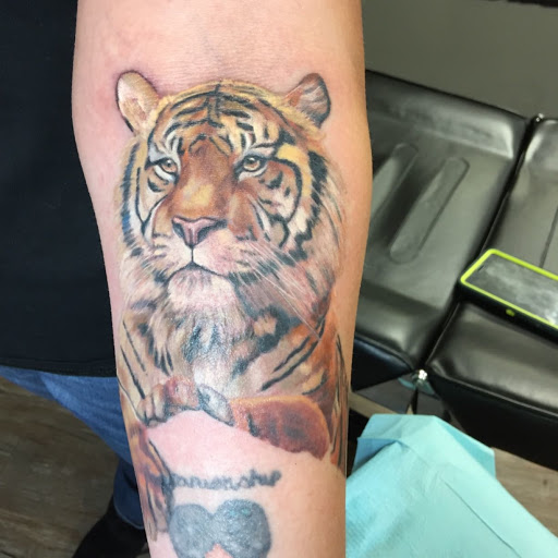 Explore camper tattoo ideas, creative tattoo ideas in Youngstown, available at BAREKNUCKLE TATTOO & BARBERSHOP