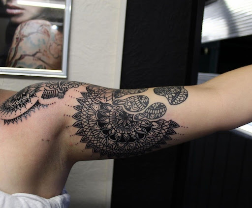 Explore tattoo flower ideas, creative tattoo ideas in Millsboro, available at Tattoo Galaxy (Millsboro) Piercing & Custom tattoos