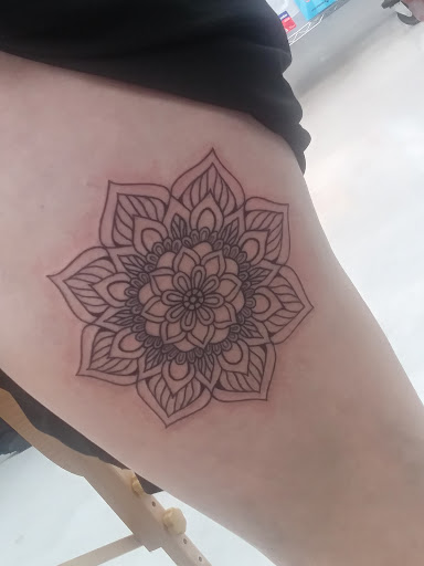 Find tattoo ideas for under the breast for your next unique tattoo in Yuba City at Righteous Ink