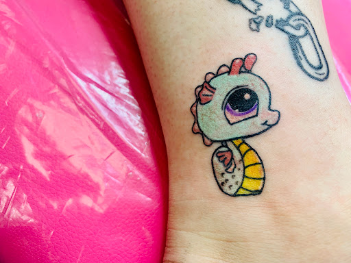 Explore soccer tattoo ideas, creative tattoo ideas in Lake City, available at Crooked Spines Tattoo Studio