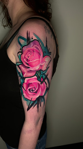 Explore dirt bike tattoo ideas, creative tattoo ideas in Lakeville, available at SharkTooth Tattoo & Gallery