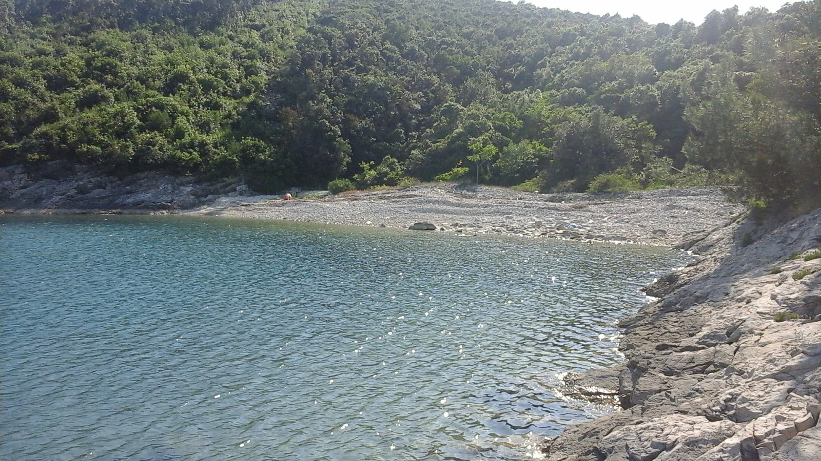 Foto av Loverica beach med turkos rent vatten yta
